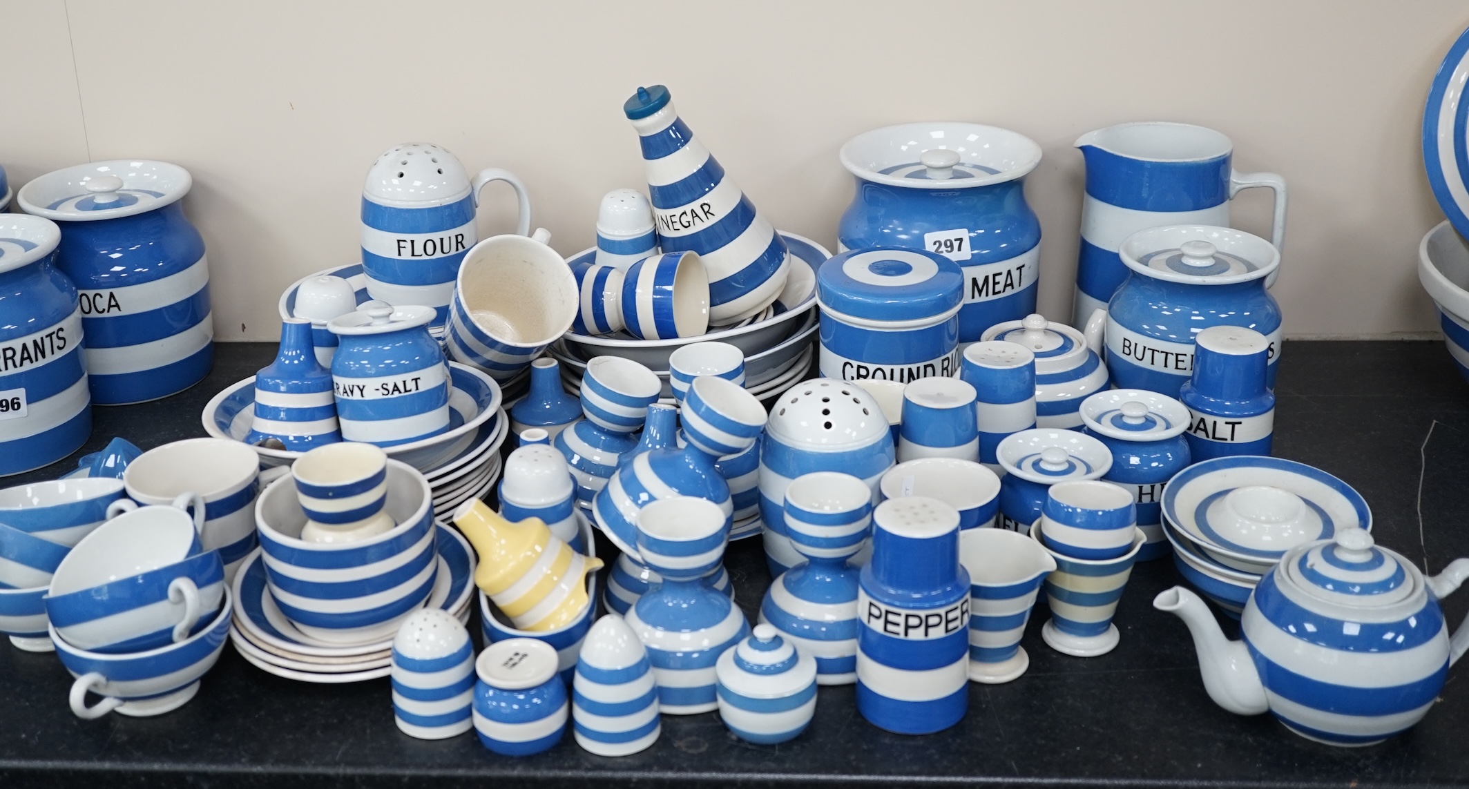 A quantity of unmarked and non T.G.Green blue and white Cornishware to include a Mincemeat jar and cover, egg cups, bowls, dishes and sifters, approximately eighty pieces. Condition - fair to good